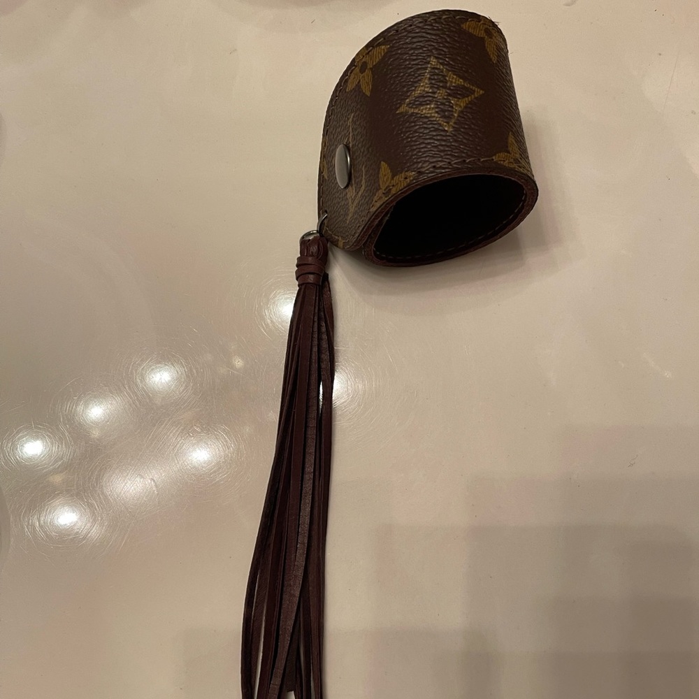 Louis Vuitton large bracelet with fringe.